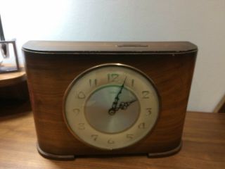 - Vintage Time Savings Clock Wind Up Wooden Mantle Clock