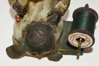 Vtg Antique Crying Baby Metal Souvenir Sewing Pin Cushion & Thread Spool Holder 3