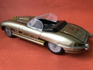 Old tin toy car Jaguar made in Hungary friction control 2