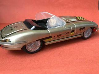 Old tin toy car Jaguar made in Hungary friction control 4