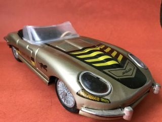 Old tin toy car Jaguar made in Hungary friction control 5