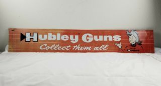 C.  1950s Vintage Hubley Toy Cap Gun Rifles Pistols Metal Advertising Sign