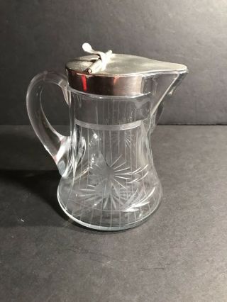 An Antique Engraved Crystal Pitcher With Metal Cover Circa 1940
