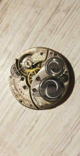 antique pocket watch movement - Elgin 12s,  17 jewels,  runs 2