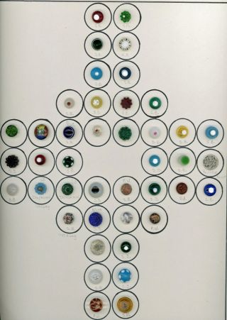 9 X 12 Card Of 42 Clear And Colored Glass Buttons.