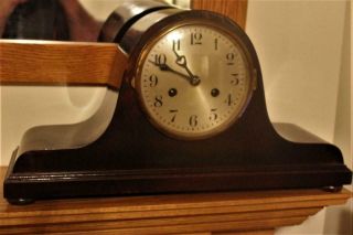 A Vintage Napoleon Hat Shaped Mantel Clock Well
