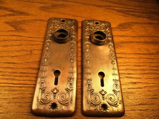 Old Pair Stamped Brass ? Bronze ? Door Knob Plates Backplate.  Escutcheons