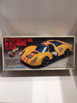 Vintage Porsche Bump - N - Go Racing Car Collectible