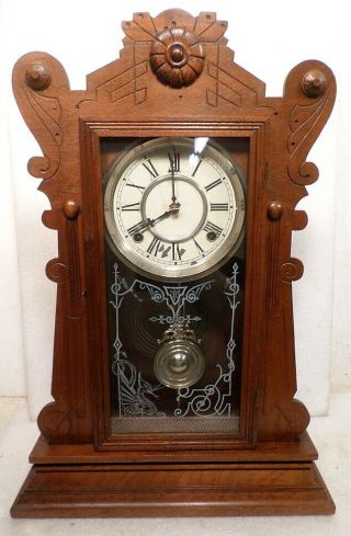 Carved American Waterbury 8 Day Striking Walnut Parlor Clock - - Dated 1874