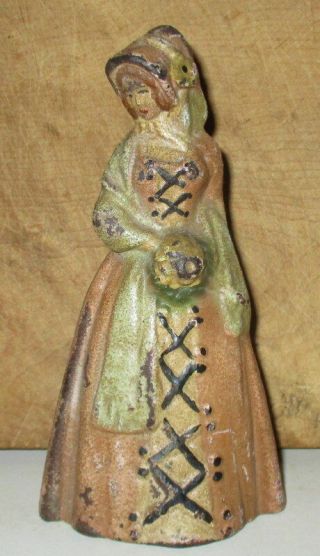 Antique Cast Iron Doorstop Colonial Dame Lady Holding Bouquet Of Flowers