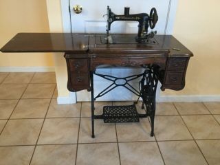 Minnesota Model A Antique Sewing Machine With Oak Cabinet