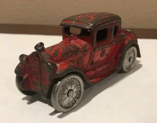 A.  C.  Williams 4 1/2” Red Cast Iron Coupe