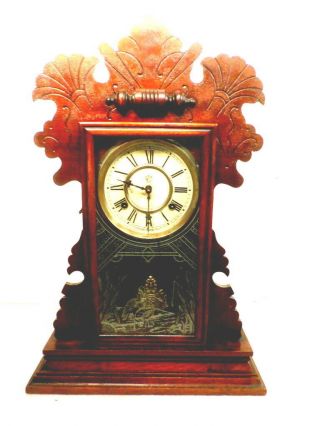 Carved American Waterbury 8 Day Striking Walnut Parlor Clock - - Circa 1880