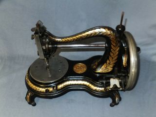1890c Jones Hand Crank Sewing Machine Paw Footed " Serpentine "