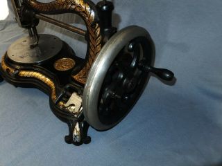 1890c Jones Hand Crank Sewing Machine Paw footed 