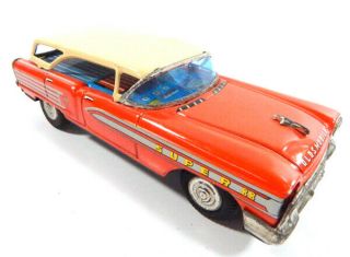 Nt Cragstan Oldsmobile 88 Red Tin Toy Friction Car Litho Interior