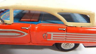 NT Cragstan Oldsmobile 88 Red Tin Toy Friction Car Litho Interior 5