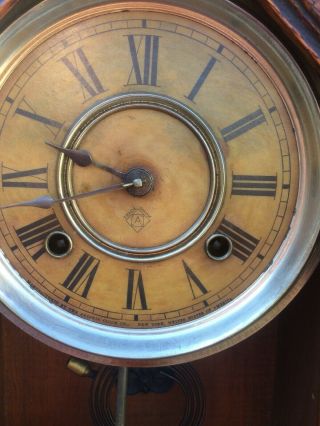 ansonia gingerbread clock vintage,  has key and a pendulum but no glass 2