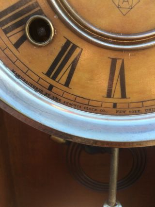 ansonia gingerbread clock vintage,  has key and a pendulum but no glass 4
