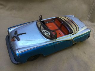 German tippco 1950s tinplate friction drive American Cadillac open top toy car 2