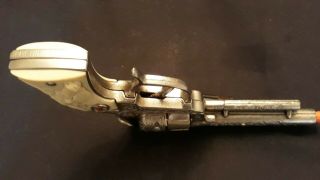 Hubley cast Iron Texan Cap Gun with bullets perfectly.  finish. 8