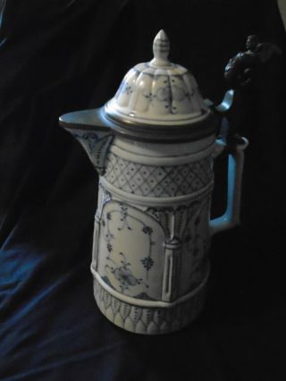 Blue And White Porcelain Pitcher With Pewter Trim