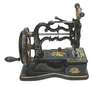 Pre - 1873 miniature cast - iron antique sewing machine 2