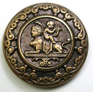 Bb Antique Brass Button W/ Cherub On A Sphinx Scene - 1 & 3/16 "