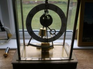 A Vintage German Kundo Electromagnetic Clock Under Glass Cover