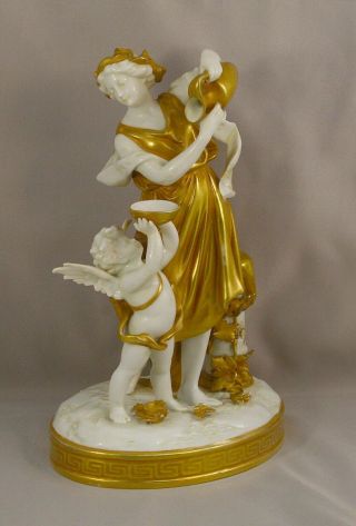 Antique Dresden Volkstedt Gold Dress Lady & Cherub Porcelain Figurine