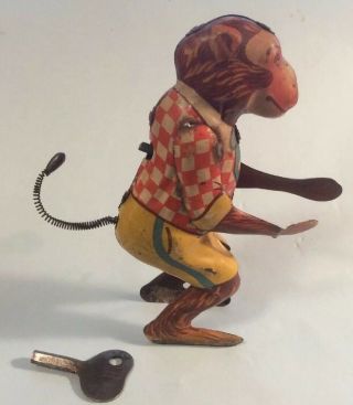 Vintage Wind Up Tin Litho Dancing Monkey With Key C.  K Toys Japan