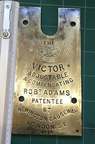 Antique English Robert Adams Crown Victor.  Brass Plaque England