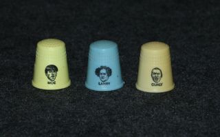 Three 3 Stooges 1990s? Plastic Thimble Set Moe Curly Larry