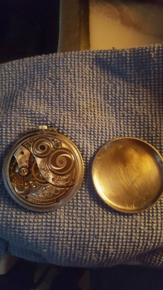 Vintage Elgin 12 size pocket watch.  Not running.  Parts or to fix.  Fancy dial. 2