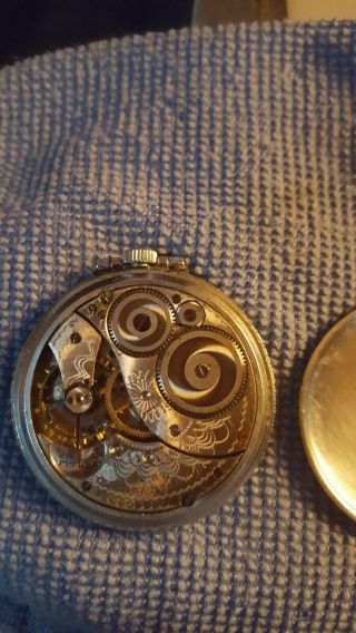 Vintage Elgin 12 size pocket watch.  Not running.  Parts or to fix.  Fancy dial. 3