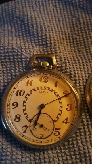 Vintage Elgin 12 size pocket watch.  Not running.  Parts or to fix.  Fancy dial. 5