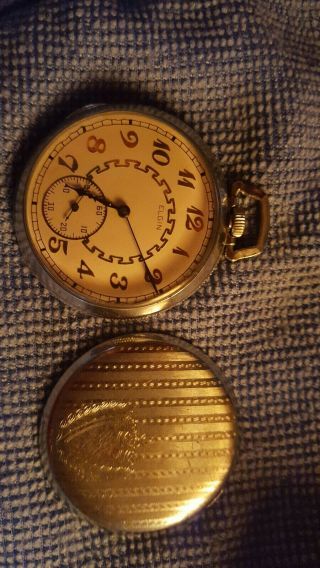 Vintage Elgin 12 size pocket watch.  Not running.  Parts or to fix.  Fancy dial. 8