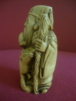 Oriental hand carving of old man with deer.  Height 3ins.  (7.  5cms) 4