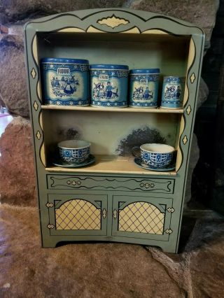 Vintage 1950s Wolverine Kitchrn Cabinet With Canisters And Cups And Saucers