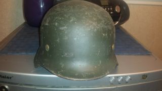 M 40 German Helmet With Liner.  No Chinstrap.  Shows Wear.