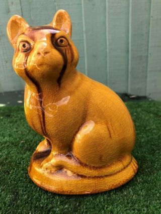 Large Staffordshire Treacle Glaze Seated Cat Of Antique Years