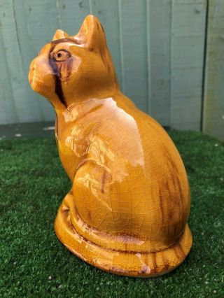 LARGE STAFFORDSHIRE TREACLE GLAZE SEATED CAT of ANTIQUE YEARS 8