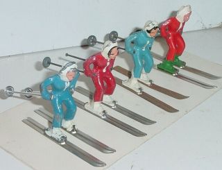 Old 1930s Barclay Lead Dimestore Winter Figures,  Female Skiiers On Tin Skis,  4pc