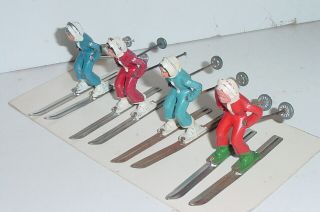 Old 1930s BARCLAY Lead Dimestore Winter Figures,  Female Skiiers On Tin Skis,  4pc 3