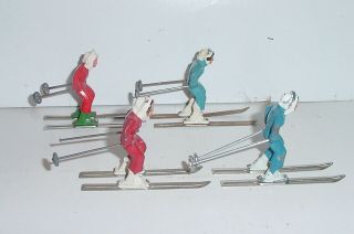Old 1930s BARCLAY Lead Dimestore Winter Figures,  Female Skiiers On Tin Skis,  4pc 7