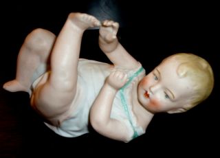 German Gebruder Heubach Bisque Porcelain Piano Baby Figurine 3102