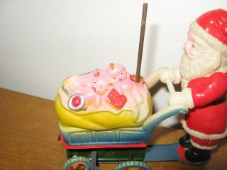 Vtg Wind Up Toy Santa Claus Celluloid Tin Litho Spinning Umbrella Cart of Toys 5