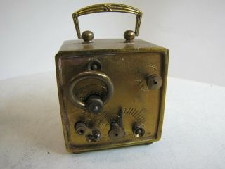 An Early Square Miniature German Alarm Clock in Travelling Case 4