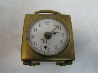 An Early Square Miniature German Alarm Clock in Travelling Case 7