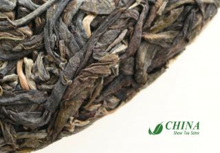 Chinese Bingdao Ancient - tree Aged Puer Cake TEA famous puer tea in china 4